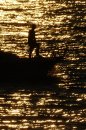 Fotografia: Tkané zlatom, fotograf: Magdaléna Šturdíková Šturdíková, tagy: #sea #sun #man
